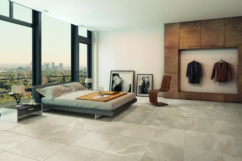 Chambre avec un carrelage de sol beige effet pierre en 60x60